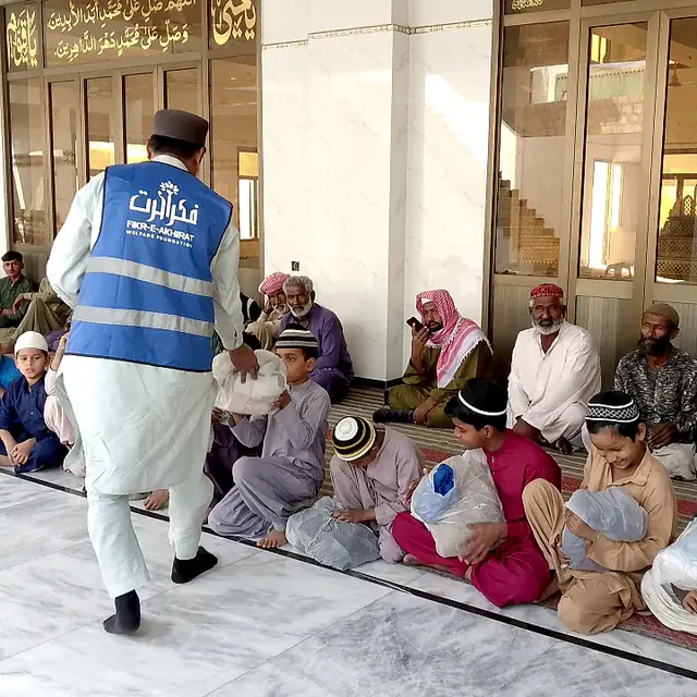 Distribution to Children and Elders at the Masjid